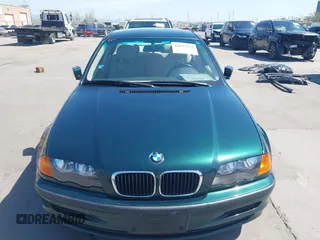 1999 BMW 3 Series 323i with VIN WBAAM3336XFP55691, listed as a IAAI auction lot 42033522 with 129,067 mi miles. Bid and sale history available at carsss.com. Image 12.