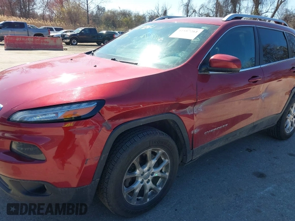 2015 Jeep Cherokee Latitude with VIN 1C4PJMCB6FW714656, listed as a IAAI auction lot 41887261 with 131,600 mi miles and . Bid and sale history available at carsss.com. Image 6.