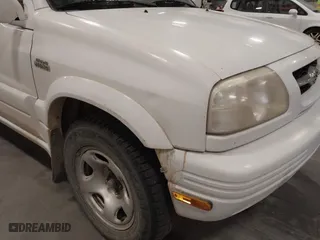 2000 Suzuki Grand Vitara JLX with VIN JS3TD62VXY4130242, listed as a IAAI auction lot 41701849 with 106,700 mi miles. Bid and sale history available at carsss.com. Image 6.