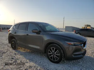 2017 Mazda CX-5 Grand Touring with VIN JM3KFBDL1H0148961, listed as a Copart auction lot 52648115 with 171,767 mi miles and Salvage Title. Bid and sale history available at carsss.com. Image 4.