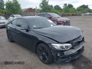 2015 BMW 4 Series 428i xDrive z VIN WBA3N9C56FK246586, wystawiony jako IAAI lot #40138540 z przebiegiem 127 512 mil mil oraz . Historia ofert i sprzedaży dostępna na DreamBid. Obrazek 1.
