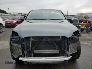 2014 Audi Q7 Premium Plus with VIN WA1LMAFE8ED015737, listed as a Copart auction lot 62099545 with 129,505 mi miles and Salvage title. Bid and sale history available at DreamBid. Image 5.