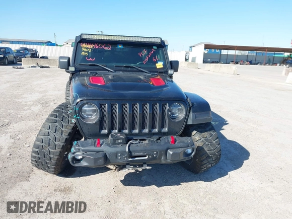 2018 Jeep Wrangler Unlimited Rubicon z VIN 1C4HJXFGXJW108766, wystawiony jako IAAI lot #41846062 z przebiegiem 96 791 mil mil oraz . Historia ofert i sprzedaży dostępna na DreamBid. Obrazek 6.