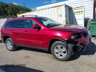 2014 Jeep Grand Cherokee Laredo with VIN 1C4RJFAG8EC262292, listed as a IAAI auction lot 40568162 with 124,871 mi miles and . Bid and sale history available at DreamBid. Image 14.