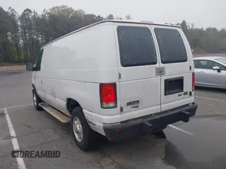 2012 Ford Econoline Cargo Recreational with VIN 1FTNE2EW8CDA64042, listed as a IAAI auction lot 42197470 with 130,647 mi miles. Bid and sale history available at carsss.com. Image 3.
