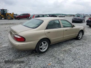 2001 Mazda 626 LX z VIN 1YVGF22C715202574, wystawiony jako Copart lot #54132915 z przebiegiem 237 041 mil mil oraz Szkody całkowita. Historia ofert i sprzedaży dostępna na DreamBid. Obrazek 3.