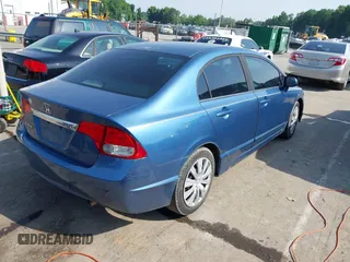 2011 Honda Civic LX with VIN 19XFA1F5XBE029404, listed as a IAAI auction lot 42261127 with 206,812 mi miles and . Bid and sale history available at DreamBid. Image 4.