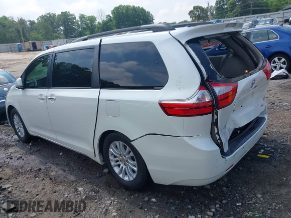 2015 Toyota Sienna XLE with VIN 5TDYK3DC5FS613045, listed as a IAAI auction lot 42276147 with 108,271 mi miles and . Bid and sale history available at DreamBid. Image 3.