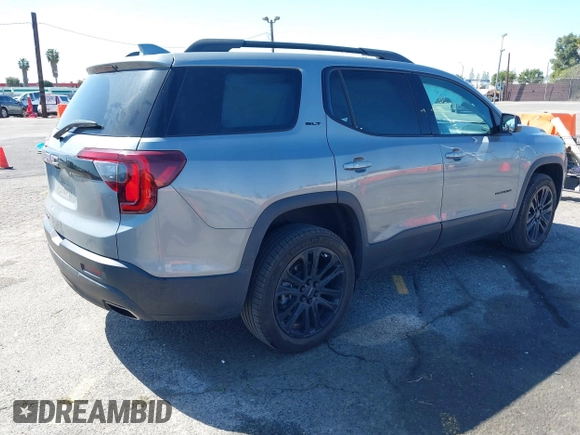 2023 GMC Acadia SLT with VIN 1GKKNML40PZ119581, listed as a IAAI auction lot 41841288 with 23,611 mi miles and . Bid and sale history available at DreamBid. Image 4.