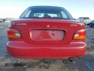1997 Hyundai Accent z VIN KMHVF24N9VU356190, wystawiony jako Copart lot #85610774 z przebiegiem 91 707 mil mil oraz Tytuł czysty. Historia ofert i sprzedaży dostępna na DreamBid. Obrazek 6.