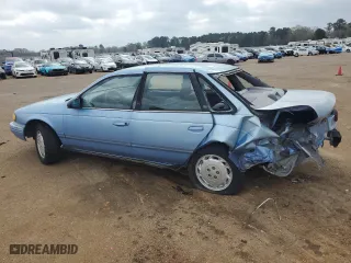 1994 Ford Taurus GL with VIN 1FALP5241RA141548, listed as a Copart auction lot 49275605 with 42,782 mi miles and Salvage Title. Bid and sale history available at carsss.com. Image 2.