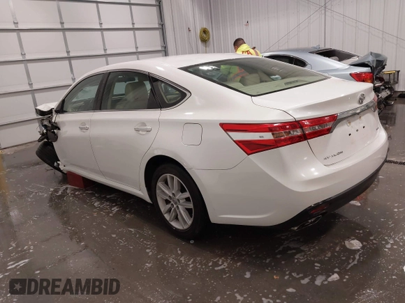 2014 Toyota Avalon Limited with VIN 4T1BK1EB1EU088538, listed as a IAAI auction lot 41793990 with 75,244 mi miles. Bid and sale history available at carsss.com. Image 3.
