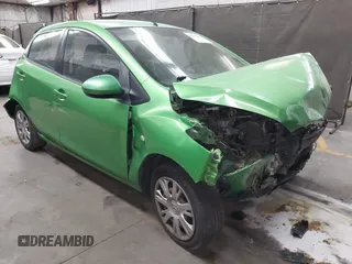 2012 Mazda 2 Sport z VIN JM1DE1KY1C0145306, wystawiony jako IAAI lot #42386919 z przebiegiem 163 733 mil mil oraz . Historia ofert i sprzedaży dostępna na DreamBid. Obrazek 1.