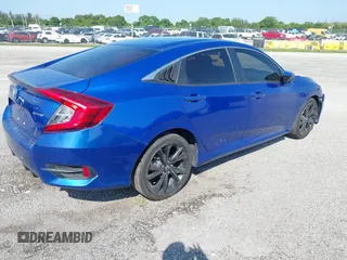 2019 Honda Civic Sport with VIN 19XFC2F83KE014463, listed as a IAAI auction lot 41439533 with 84,379 mi miles and . Bid and sale history available at DreamBid. Image 4.