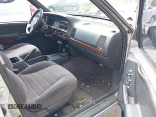 1996 Jeep Grand Cherokee Laredo with VIN 1J4EX58S1TC122268, listed as a IAAI auction lot 42005236 with 288,466 mi miles. Bid and sale history available at carsss.com. Image 5.
