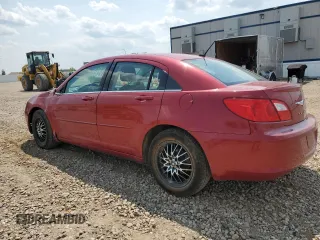 2010 Chrysler Sebring Limited with VIN 1C3CC5FD1AN197099, listed as a Copart auction lot 59128825 with 85,736 mi miles and Salvage title. Bid and sale history available at DreamBid. Image 2.