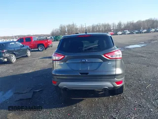 2016 Ford Escape SE with VIN 1FMCU9GX1GUB67636, listed as a IAAI auction lot 41929725 with 68,297 mi miles. Bid and sale history available at carsss.com. Image 16.