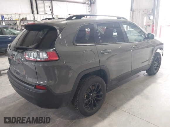 2023 Jeep Cherokee Altitude Lux with VIN 1C4PJMMBXPD115299, listed as a IAAI auction lot 41992492 with 60,232 mi miles. Bid and sale history available at carsss.com. Image 4.