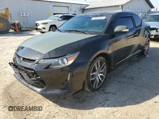 2016 Scion tC with VIN JTKJF5C79GJ014274, listed as a Copart auction lot 49000685 with 83,607 mi miles and Salvage Title. Bid and sale history available at carsss.com. Image 1.