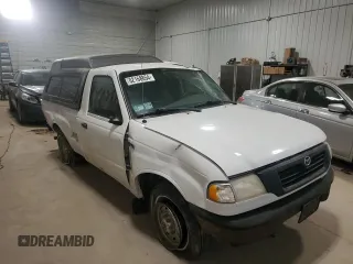 2000 Mazda B-Series 2WD Truck SX with VIN 4F4YR12CXYTM35082, listed as a Copart auction lot 82168854 with 0 mi miles and Salvage Title. Bid and sale history available at carsss.com. Image 4.