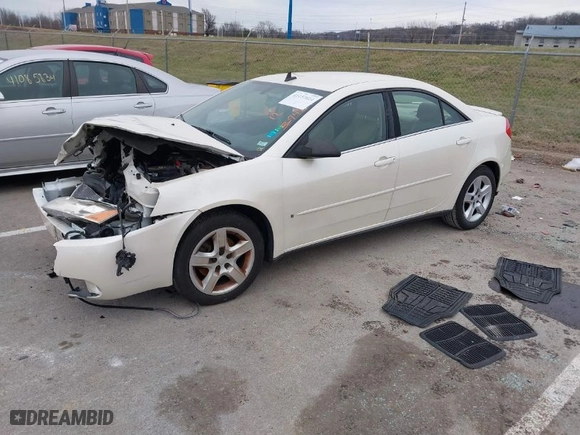 2009 Pontiac G6 w/1SA *Ltd Avail* with VIN 1G2ZG57BX94126657, listed as a IAAI auction lot 41157614 with 108106 miles. Bid and sale history available at carsss.com. Image 2.