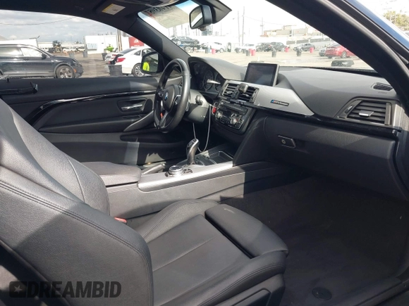 2014 BMW 4 Series 428i with VIN WBA3N7C55EF719504, listed as a IAAI auction lot 41403957 with 98,882 mi miles and . Bid and sale history available at carsss.com. Image 5.