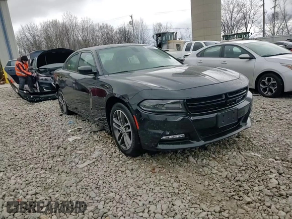 2019 Dodge Charger SXT with VIN 2C3CDXJG9KH523879, listed as a Copart auction lot 82988364 with 71,386 mi miles and Salvage Title. Bid and sale history available at DreamBid. Image 14.