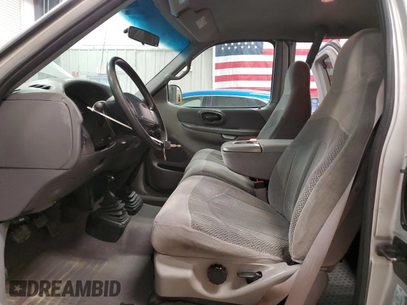 1999 Ford F-150 with VIN 1FTRX18W2XKB01444, listed as a Copart auction lot 52717195 with 210,581 mi miles and Clean title. Bid and sale history available at DreamBid. Image 7.