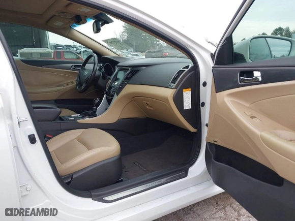 2014 Hyundai Sonata Hybrid with VIN KMHEC4A48EA104853, listed as a IAAI auction lot 41527002 with 130,853 mi miles. Bid and sale history available at carsss.com. Image 5.