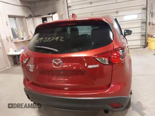 2013 Mazda CX-5 Touring with VIN JM3KE4CEXD0120913, listed as a IAAI auction lot 41973792 with 129,202 mi miles. Bid and sale history available at carsss.com. Image 16.