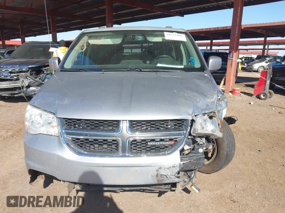 2015 Dodge Grand Caravan SXT with VIN 2C4RDGCG1FR649074, listed as a IAAI auction lot 41759409 with 116,856 mi miles and . Bid and sale history available at DreamBid. Image 13.