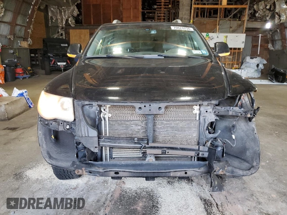 2010 Volkswagen Touareg VR6 with VIN WVGBF7A99AD002591, listed as a Copart auction lot 70624234 with 154,330 mi miles and Salvage Title. Bid and sale history available at DreamBid. Image 5.