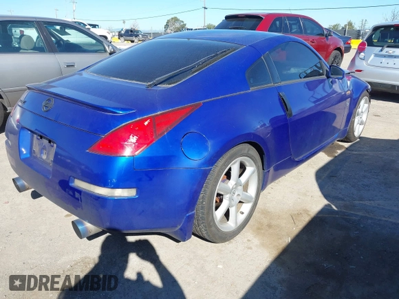 2004 Nissan 350Z Touring with VIN JN1AZ34D34T165329, listed as a IAAI auction lot 41872788 with 199,196 mi miles. Bid and sale history available at carsss.com. Image 4.