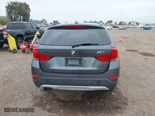 2013 BMW X1 28i with VIN WBAVM1C51DVW42577, listed as a IAAI auction lot 42029627 with 140,343 mi miles. Bid and sale history available at carsss.com. Image 17.