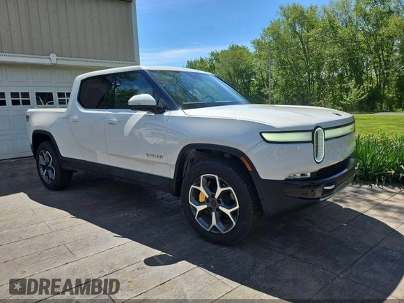 2023 Rivian R1T Adventure z VIN 7FCTGAAA1PN020478, wystawiony jako IAAI lot #42361936 z przebiegiem 443 mil mil oraz . Historia ofert i sprzedaży dostępna na DreamBid. Obrazek 1.