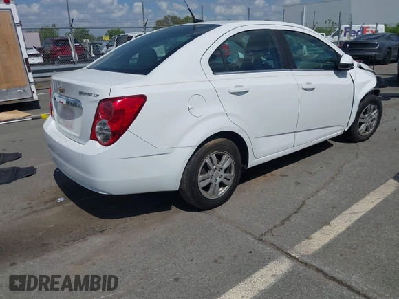 2014 Chevrolet Sonic LT with VIN 1G1JC5SH0E4232070, listed as a IAAI auction lot 41970353 with 140,557 mi miles and . Bid and sale history available at DreamBid. Image 4.