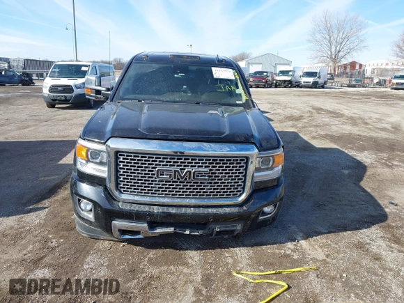 2016 GMC Sierra 2500HD Denali z VIN 1GT12UE80GF115452, wystawiony jako IAAI lot #41537973 z przebiegiem 182 800 mil mil oraz . Historia ofert i sprzedaży dostępna na DreamBid. Obrazek 12.