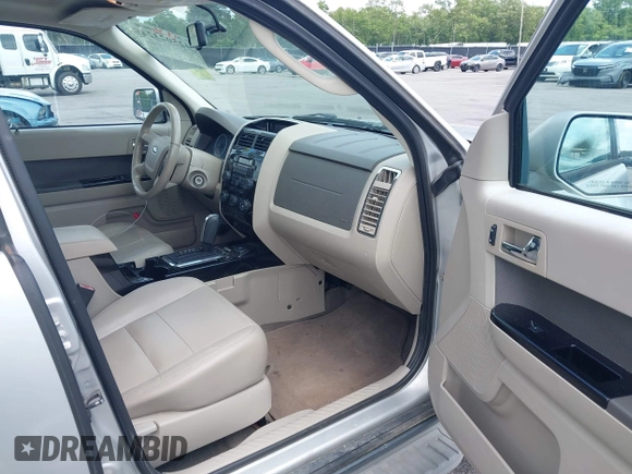 2009 Ford Escape Hybrid z VIN 1FMCU49399KB18857, wystawiony jako IAAI lot #42502324 z przebiegiem 227 828 mil mil oraz . Historia ofert i sprzedaży dostępna na DreamBid. Obrazek 5.