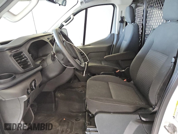 2023 Ford Transit Cargo with VIN 1FTBR1Y86PKA17978, listed as a Copart auction lot 77180324 with 20,173 mi miles and Clean Title. Bid and sale history available at DreamBid. Image 7.