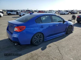 2015 Subaru WRX with VIN JF1VA1A65F9817356, listed as a Copart auction lot 62719375 with 143,518 mi miles and Salvage title. Bid and sale history available at DreamBid. Image 3.