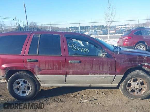 2000 Jeep Grand Cherokee Laredo with VIN 1J4GW48N3YC231743, listed as a IAAI auction lot 41316680 with Not provided miles and . Bid and sale history available at DreamBid. Image 13.