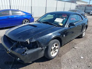 2004 Ford Mustang Standard with VIN 1FAFP40604F156534, listed as a IAAI auction lot 41794486 with 216,207 mi miles. Bid and sale history available at carsss.com. Image 2.