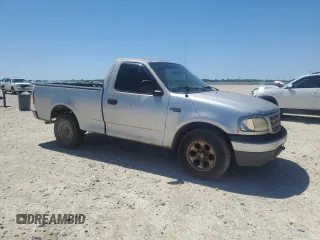 2000 Ford F-150 XL with VIN 1FTZF1722YKA51583, listed as a Copart auction lot 53860835 with 163,877 mi miles and Clean title. Bid and sale history available at DreamBid. Image 4.