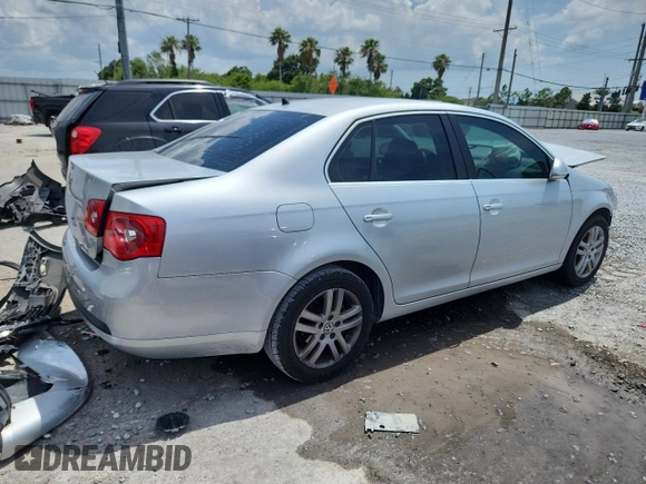 2007 Volkswagen Jetta Wolfsburg Edition z VIN 3VWEF71K57M189021, wystawiony jako Copart lot #59019685 z przebiegiem 124 720 mil mil oraz Szkoda całkowita • Salvage title. Historia ofert i sprzedaży dostępna na DreamBid. Obrazek 3.
