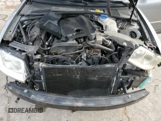 2003 Volkswagen Passat GLS z VIN WVWPD63B33P265784, wystawiony jako Copart lot #79492104 z przebiegiem 185 692 mil mil oraz Szkoda całkowita • Salvage title. Historia ofert i sprzedaży dostępna na DreamBid. Obrazek 11.