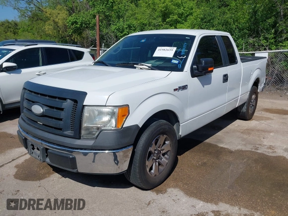 2009 Ford F-150 STX with VIN 1FTRX12W89KC52056, listed as a IAAI auction lot 41982659 with 318,539 mi miles. Bid and sale history available at carsss.com. Image 2.