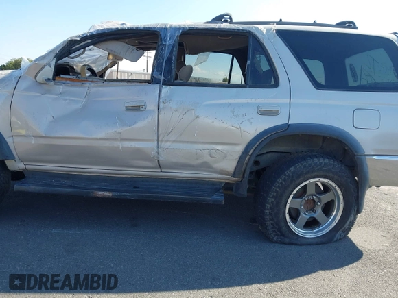 1998 Toyota 4Runner SR5 z VIN JT3GN86RXW0058568, wystawiony jako IAAI lot #38222829 z przebiegiem 217 390 mil mil oraz . Historia ofert i sprzedaży dostępna na DreamBid. Obrazek 6.