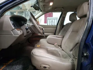 2004 Ford Crown Victoria LX z VIN 2FAFP74W94X171212, wystawiony jako Copart lot #82830214 z przebiegiem 217 595 mil mil oraz Szkody całkowita. Historia ofert i sprzedaży dostępna na DreamBid. Obrazek 7.