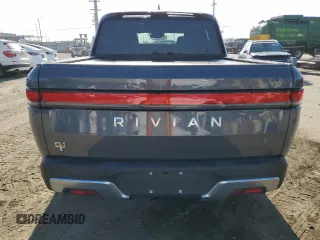 2022 Rivian R1T Adventure z VIN 7FCTGAAA9NN008771, wystawiony jako Copart lot #56243835 z przebiegiem 31 006 mil mil oraz Szkody całkowita. Historia ofert i sprzedaży dostępna na DreamBid. Obrazek 6.