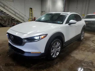 2021 Mazda CX-30 Premium with VIN 3MVDMBDM0MM215197, listed as a Copart auction lot 50207265 with 27,353 mi miles and Salvage Title. Bid and sale history available at carsss.com. Image 1.